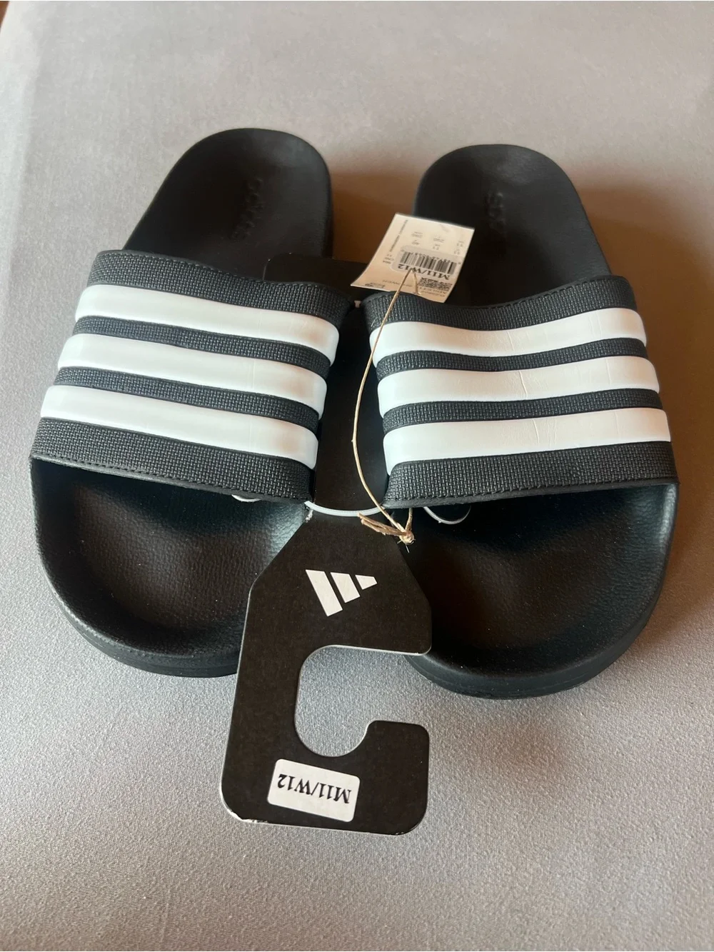Adidas Black Cloud Foam Adilette Shower Slides.  Fits men’s 11 & women’s 12, new